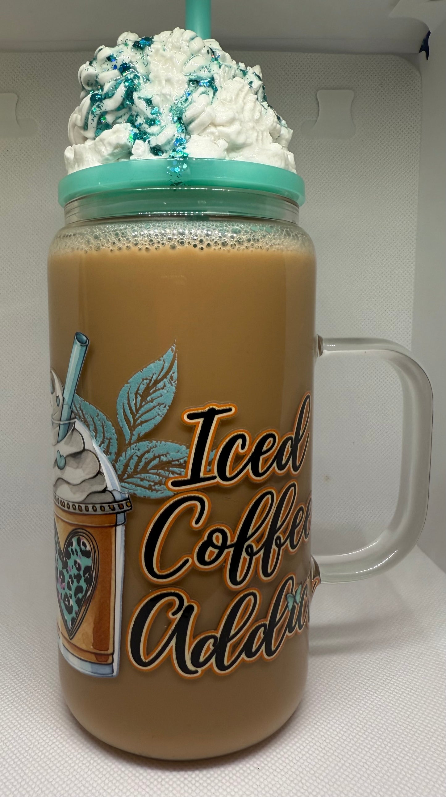 Highland Cow Coffee Addict 16 oz glass snow globe with handle and “whipped cream” lid