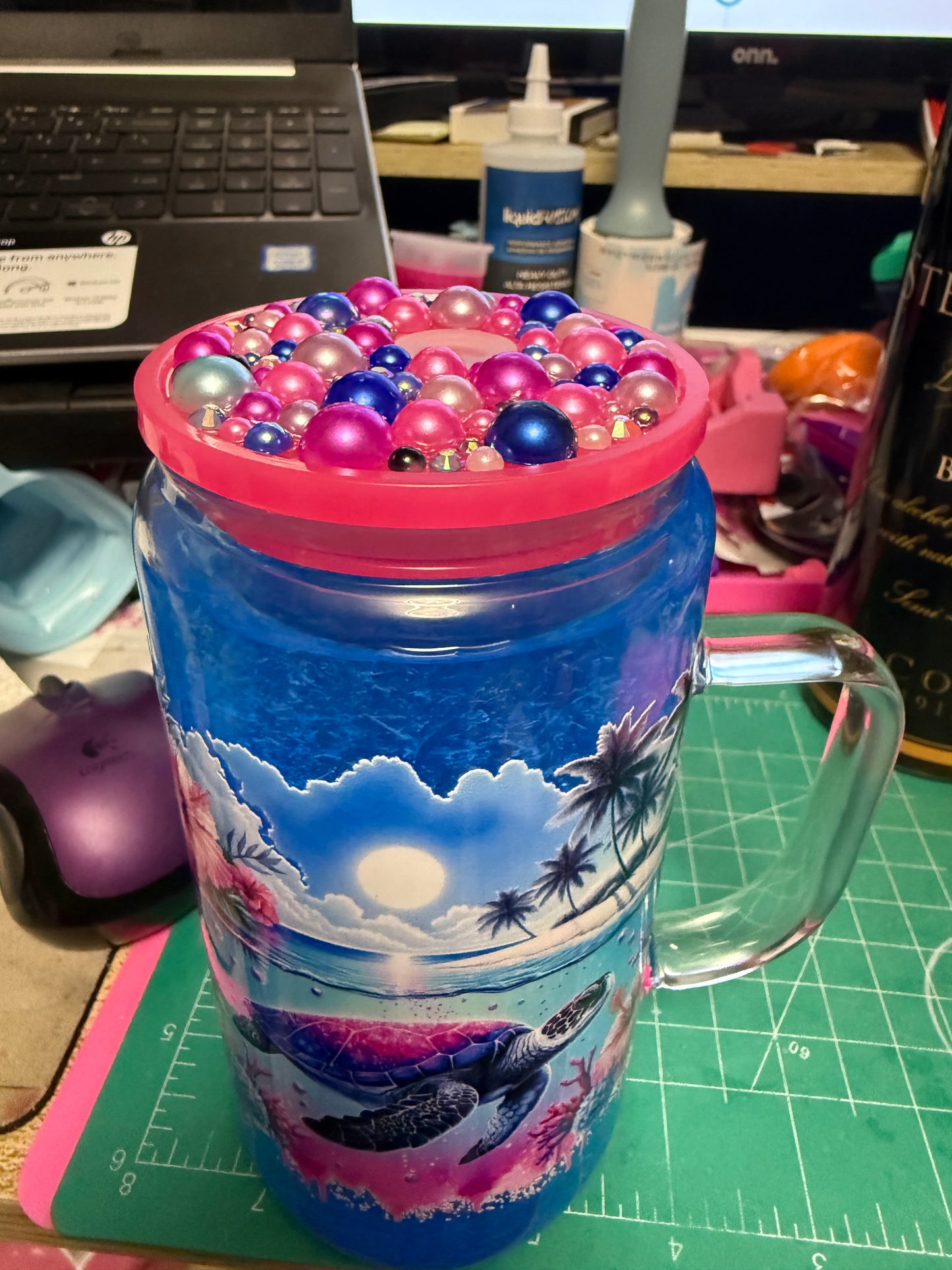 Turtle Island with blue slush and bling lid 16 oz glass snow globe with handle